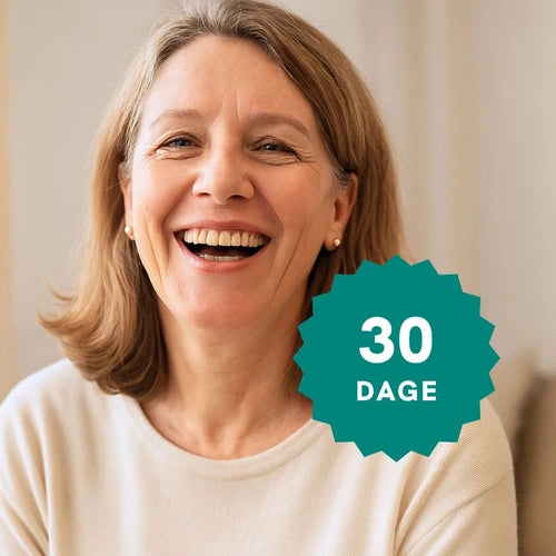 Smilende kvinde med 30-dages badge
