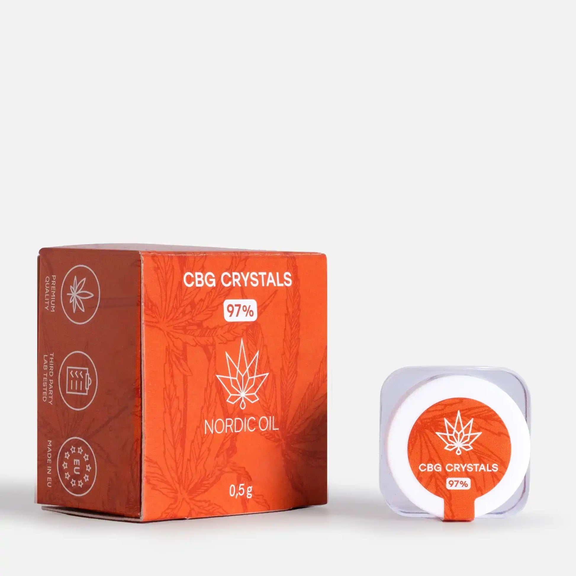 CBG-krystaller i orange æske og lille hvid beholder med Nordic Oil-logo og 97%