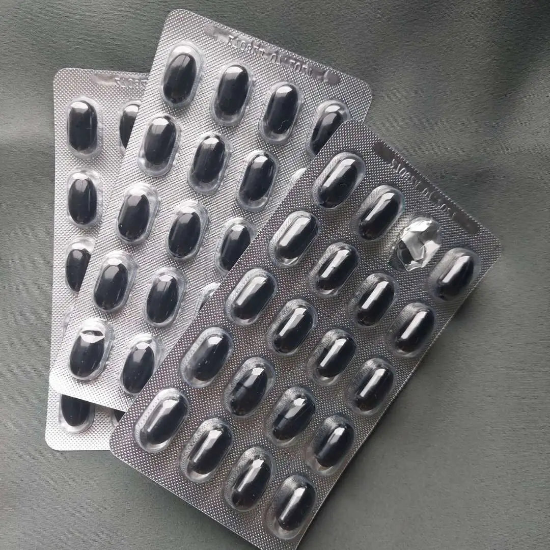 Blisterpakker med mørke kapsler til kosttilskud
