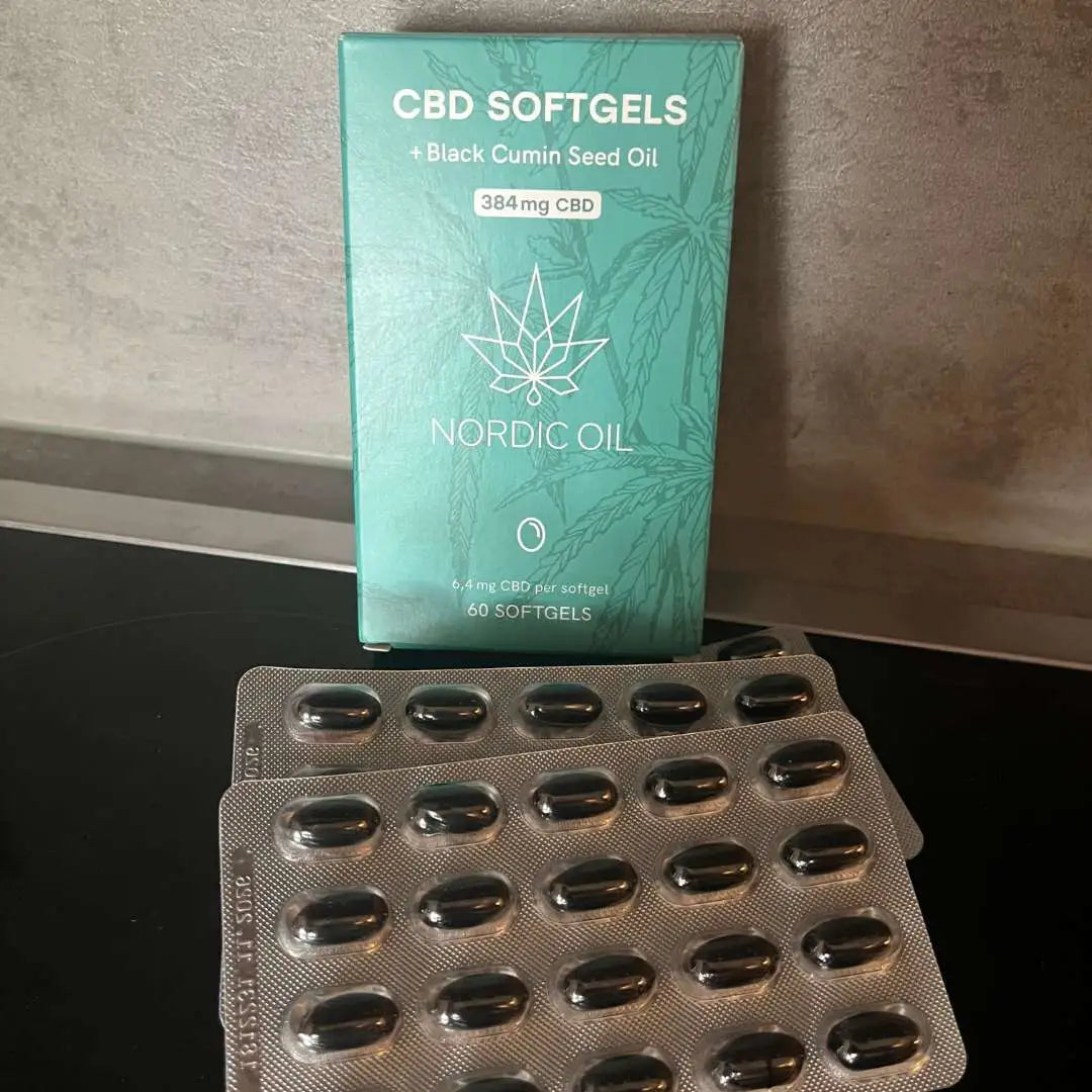 Nordic Oil CBD softgels med sortkommen frøolie og blisterpakninger