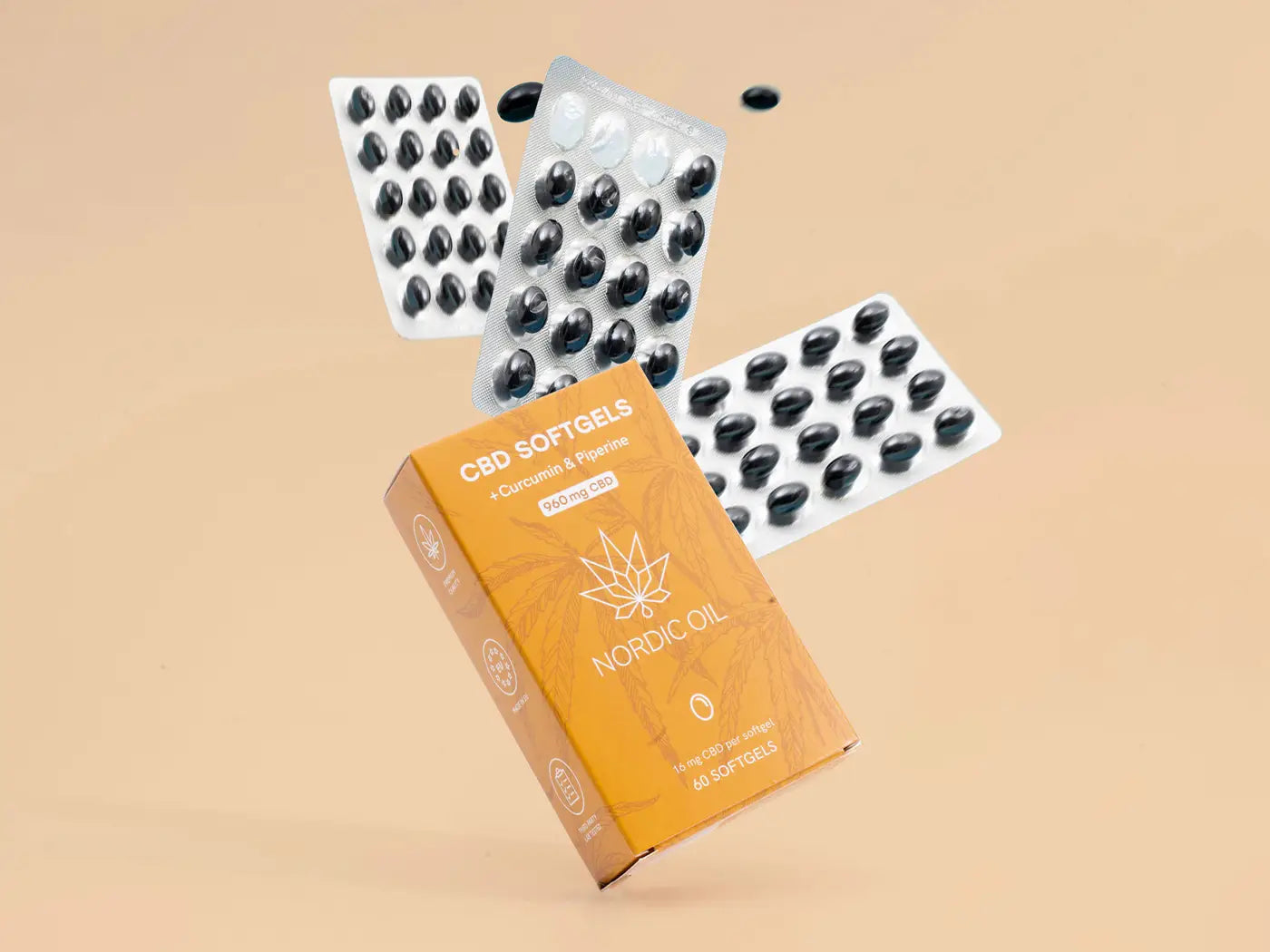 CBD-softgels med curcumin og piperin i orange Nordic Oil emballage