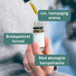 Hånd, der drypper CBD-olie fra en dropper ned i en lille glasflaske mærket CBD Drops