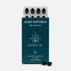 Nordic Oil Sleep Softgels med CBD og melatonin i blå emballage med blister og to sorte kapsler foran