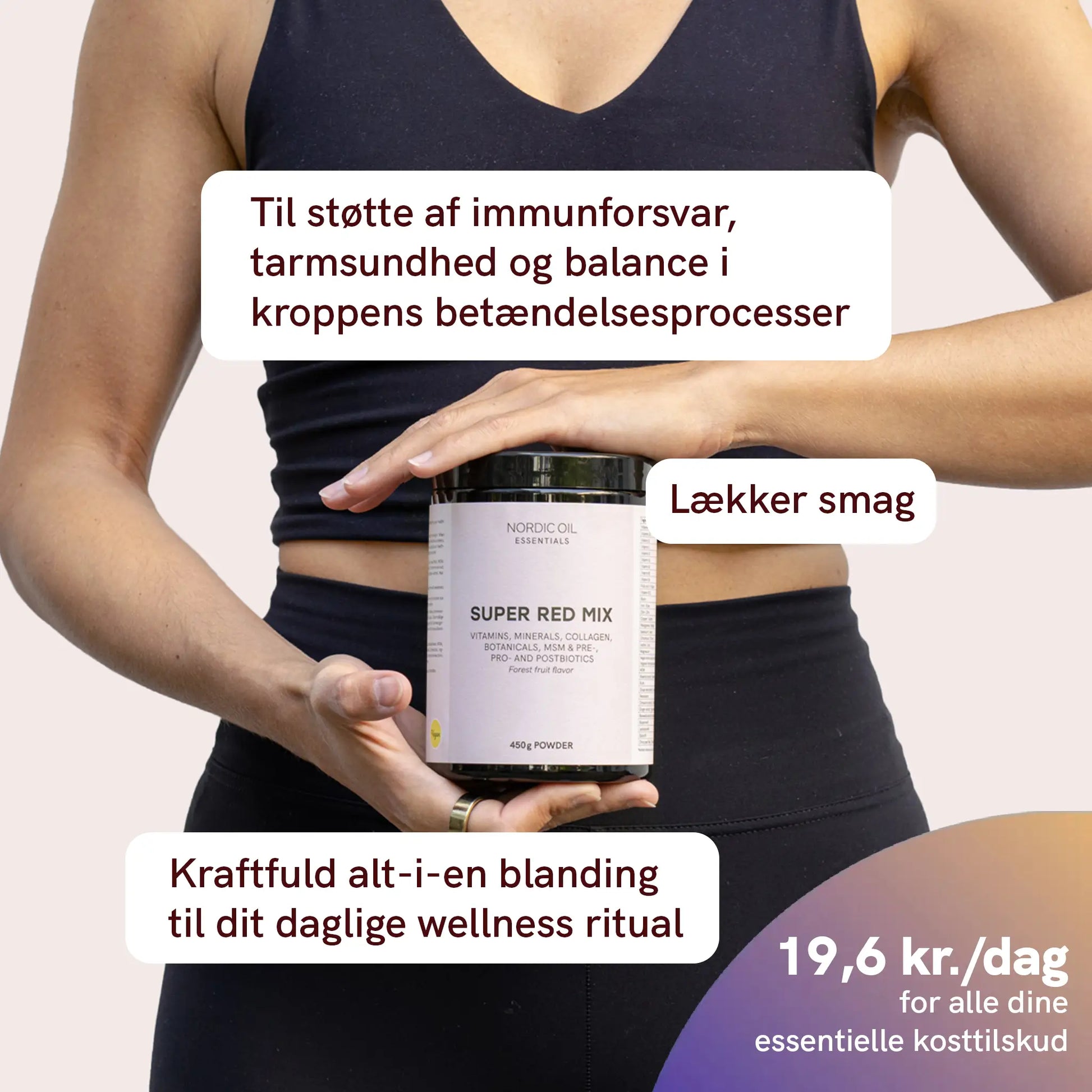 Person holder en Nordic Oil Essentials Super Red Mix-krukke.
